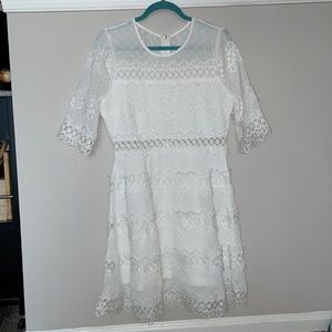 Just Me Brand New without tags white lace 3/4 sleeve dress. Never worn